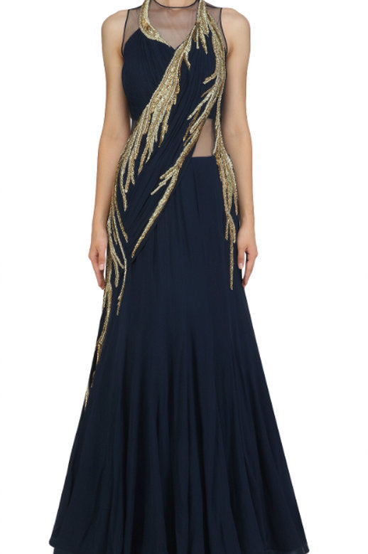 Tasuvure Indies Metallic Pre-draped Saree Gown | Silver, Plain, Pleated,  Round, Sleeveless in 2023 | Saree gown, Drape saree, Draped saree gown