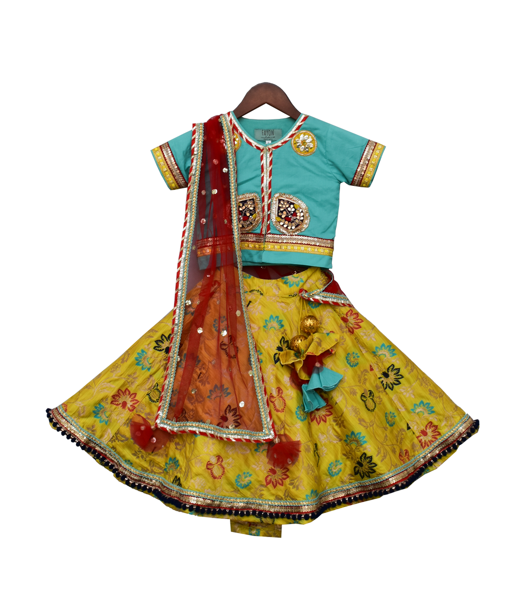 Girls Yellow Brocade Lehenga With Blue Choli