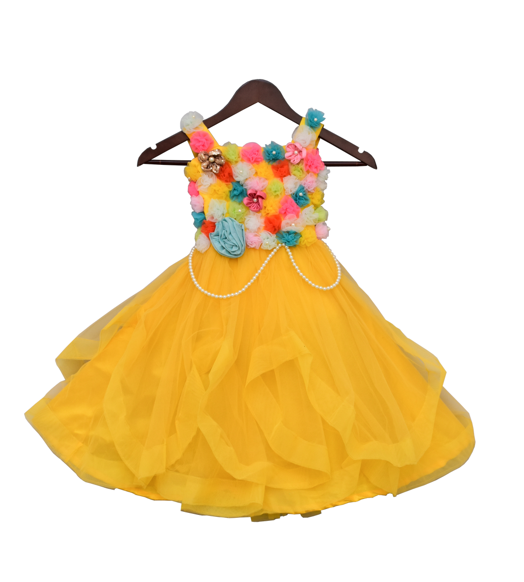 Girls Yellow Gown With Multi Colours Flowers